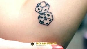 A body tattoo with a design of a dice 