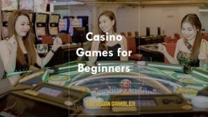 Asian Gamblers Playing in a Casino Hotel